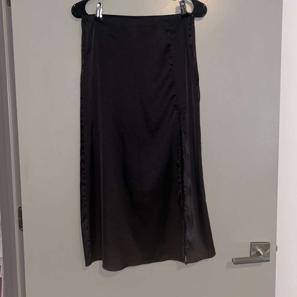 Long black satin skirt with off center slit